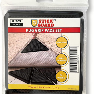 Packaging of StickGuard rug grip pads showing the product and its name, with a picture of a rug on a floor demonstrating the use of the grip pads.